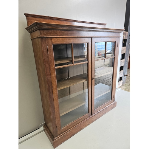 1011 - Oak Glazed Bookcase H145cm W123cm D32cm