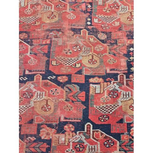 1059 - Persian Style Rustic Coloured Rug L388cm W163cm