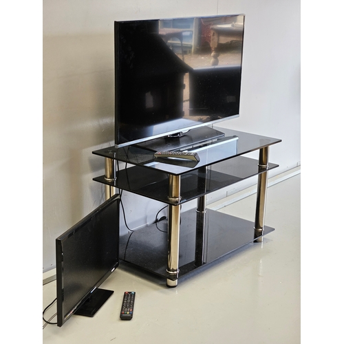 1157 - Samsung TV On Stand With Remote, Blaupunkt TV With Remote