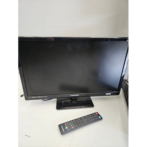 1157 - Samsung TV On Stand With Remote, Blaupunkt TV With Remote