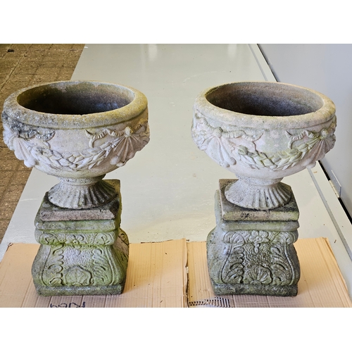 1198 - A Pair Of Ware Urns On Plinths H58cm W40cm