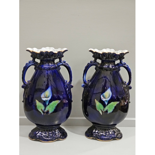 141 - A Pair Of Early Mantel Vases H39cm