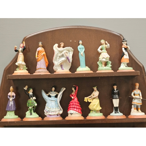 167 - 26 'Lovely Ladies Of Many Lands' From The Danbury Mint Figurines On Mahogany Stand