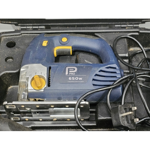 249 - Pro Electric Jigsaw, Blades & Handbook In Case