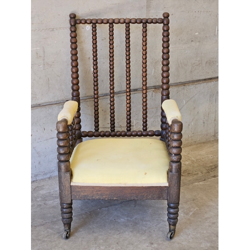 829 - An Early Oak Bobbin Chair H100cm