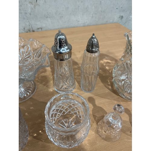 84 - Cut Glass Salt and Sugar Shakers, Cut Glass Water Jug, Glass Bells, Etc