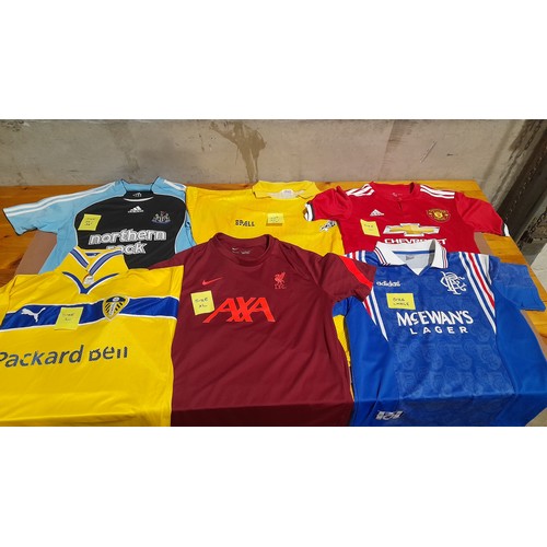 Box Including Various Football Shirts