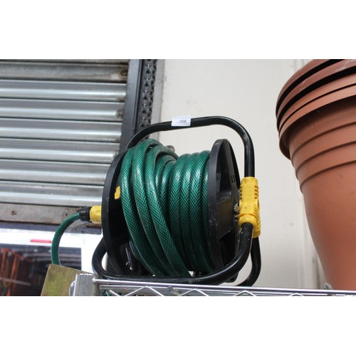 8 - GREEN HOSE ON REEL