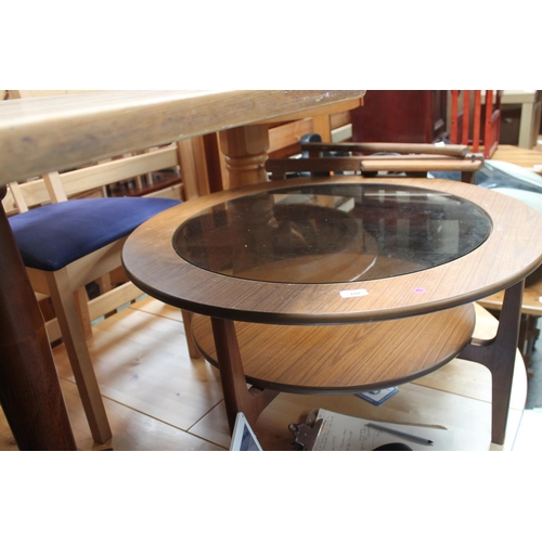 692 - 1970'S ROUND GLASS TOP COFFEE TABLE