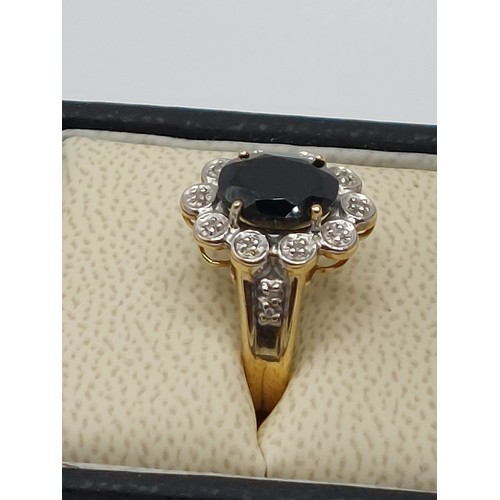 347 - 9ct GOLD GARNET & DIAMOND CLUSTER DRESS RING. 
SIZE ‘L’. WIEGHT 3.35gms HALLMARKED