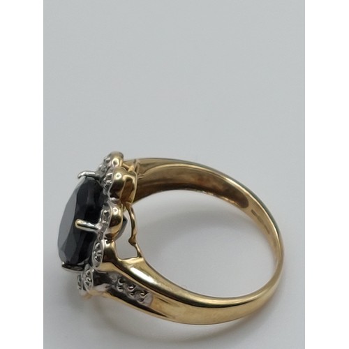 347 - 9ct GOLD GARNET & DIAMOND CLUSTER DRESS RING. 
SIZE ‘L’. WIEGHT 3.35gms HALLMARKED