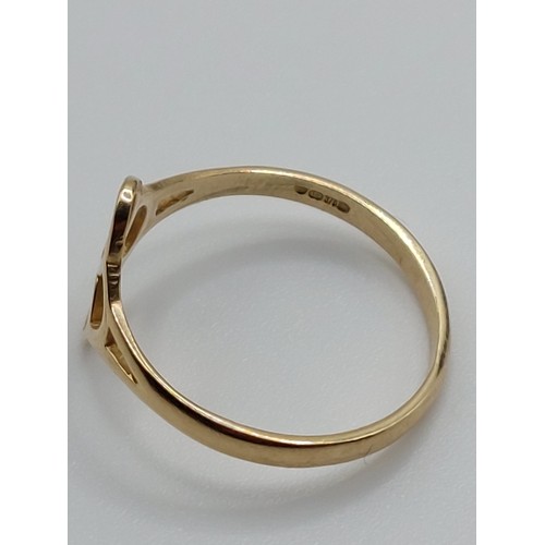 349 - 9ct GOLD CELTIC BAND SIZE ‘N’. HALLMARKED