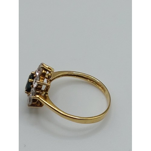 353 - 9ct GOLD GEM SET CLUSTER DRESS RING. SIZE ‘K’. WEIGHT 2.6gms. HALLMARKED