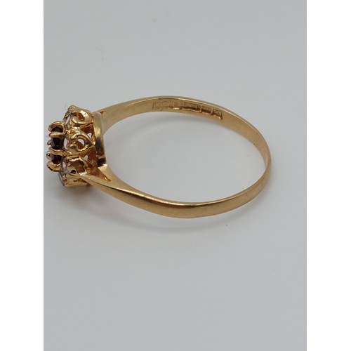 371 - 9ct GOLD GEM SET CLUSTER RING. SIZE ‘P’ HALLMARKED