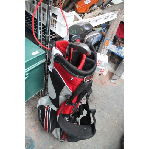 42 - GOLF BAG AND FEW CHILD SIZED CLUBS AND BALLS