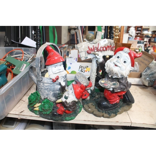 108 - 2 GARDEN GNOME DECORATIONS