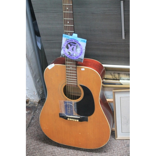 480 - ACOUSTIC GUITAR WITH SPARE STRINGS