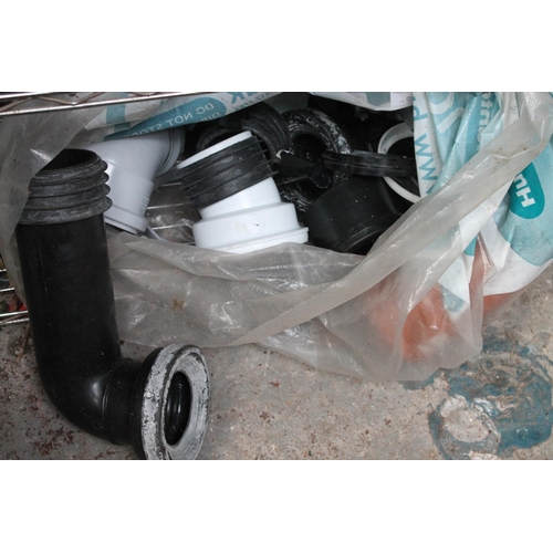 23 - LARGE BAG OF PLASTIC DRAINAGE PIPE