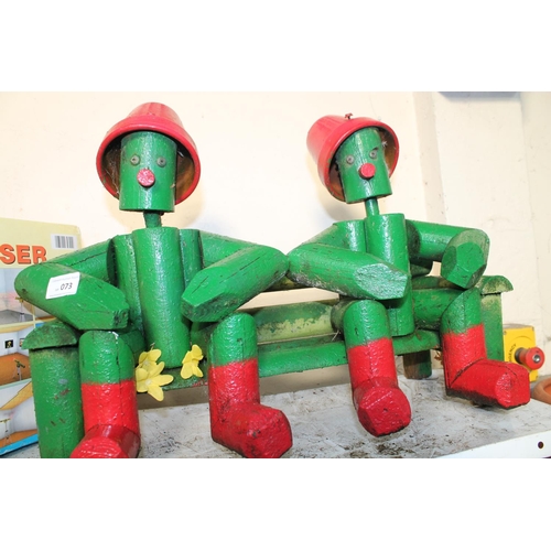 73 - DOUBLE WOODEN FIGURE OF FLOWERPOT MEN ON A BENCH