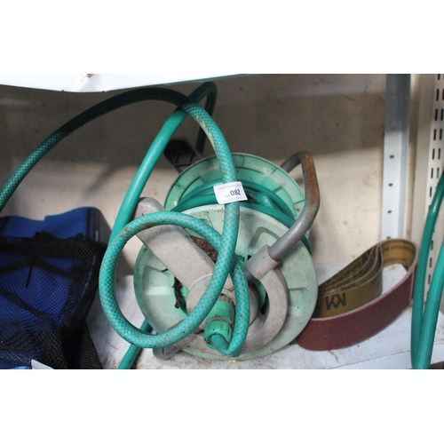 82 - GREEN HOSE ON REEL