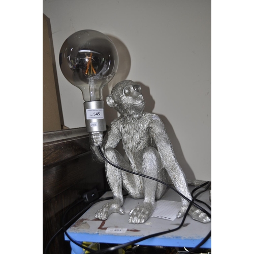 545 - SILVER COLOURED MONKEY TABLE LAMP