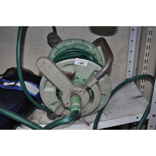 66 - GREEN HOSE ON REEL