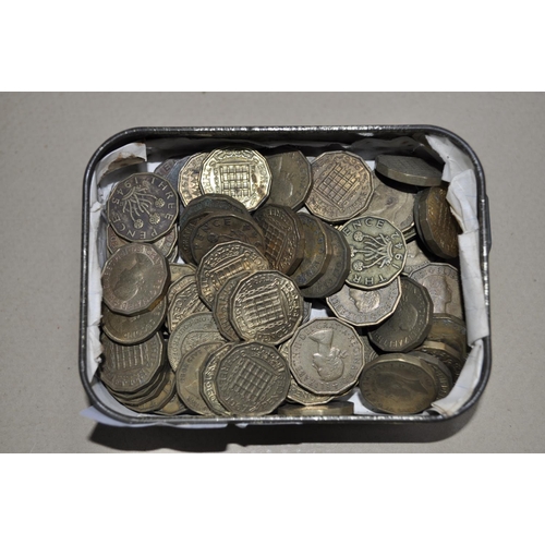 426 - SMALL TIN OF 3 PENCE PIECES