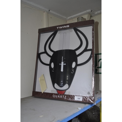 504 - TWINS QUARTZ CLOCK IN THE SHAPE OF A COWS HEAD