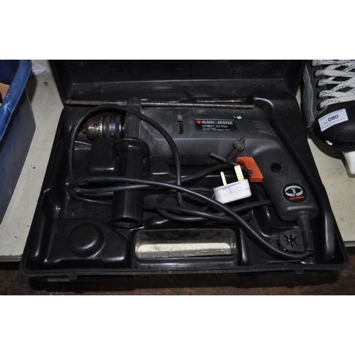 82 - CASED BLACK AND DECKER DRILL