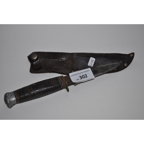 302 - LEATHER SHEATHED KNIFE