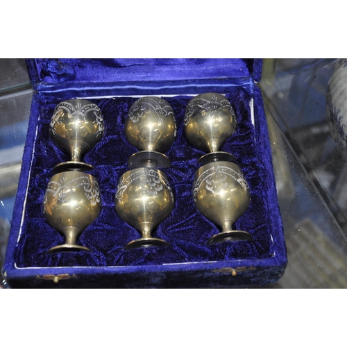 352 - CASED SET OF BRASS GOBLETS