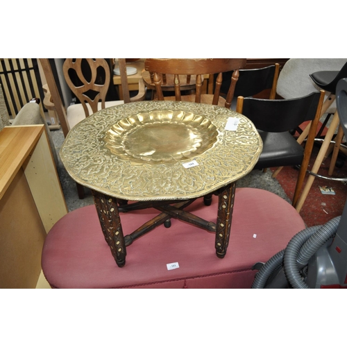 584 - INDIAN BRASS FOLDING TABLE