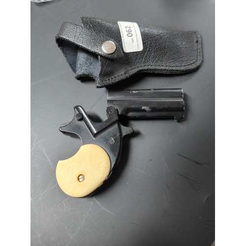 62 - ITALIAN DERRINGER STARTING PISTOL A/F  WITH HOLSTER AND BELT SLIP