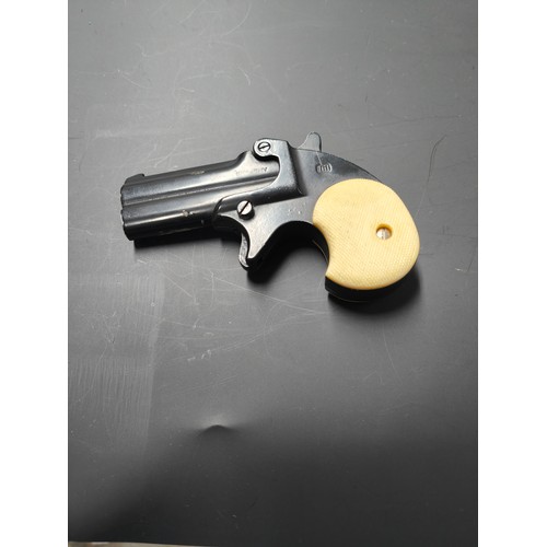 62 - ITALIAN DERRINGER STARTING PISTOL A/F  WITH HOLSTER AND BELT SLIP