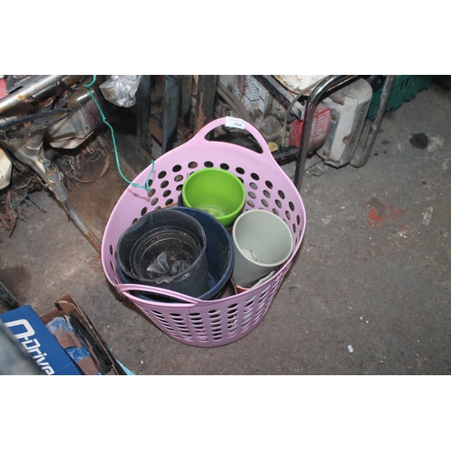 10 - LAUNDRY BASKET OF PLANT POTS