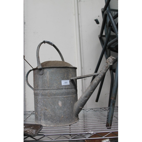 23 - GALVANISED WATERING CAN AND A SAW