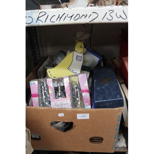 304 - BOX OF GLASSWARE, LADIES SHOES, GLASSES AND BELL