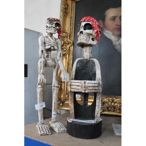 387 - 2 X WOODEN CARVED SKELETONS