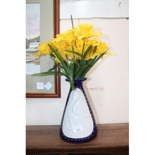 412 - BLUE AND WHITE VASE WITH DAFFODILS