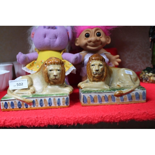 502 - PAIR OF STAFFORDSHIRE LION FIGURES