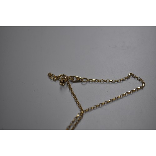 103 - 9 CT GOLD 18 INCH  2.75G  NECKLACE AND CRUCIFIX