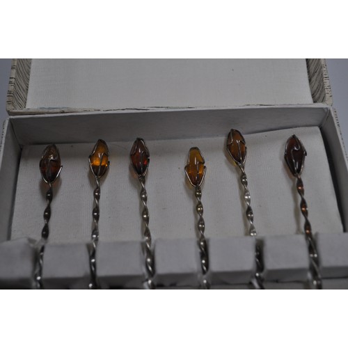 105 - BOXED SET 6 900 STAMPED SILVER AND AMBER SPOONS PLUS  1 EXTRA MATCHING SPOON