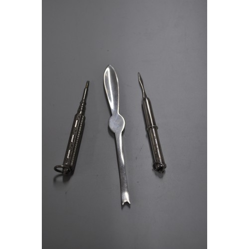 109 - WHITE METAL PROPELLING PENCIL,
  SILVER HALLMARKED RETRACTING TOOTHPICK,   AND A WALNUT PICKER