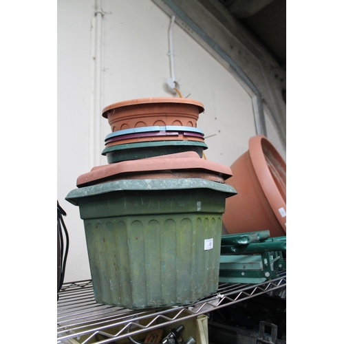 23 - LARGE QUANTITY OF GARDEN PLANT POTS