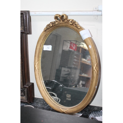 742 - OVAL GILT FRAMED WALL MIRROR