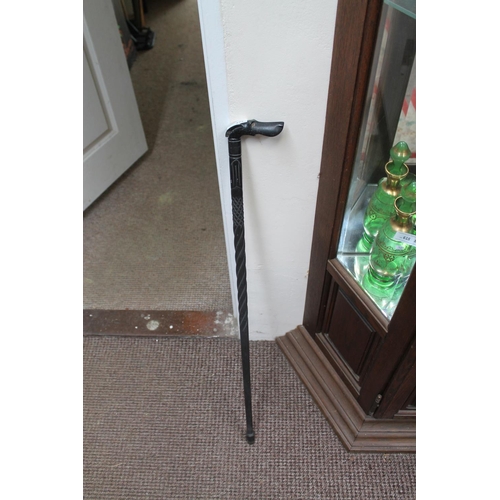 555 - EBONY CARVED HOUND WALKING CANE