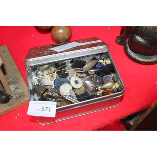 571 - TIN CONTAINING SEWING ITEMS AND HAT PINS ETC