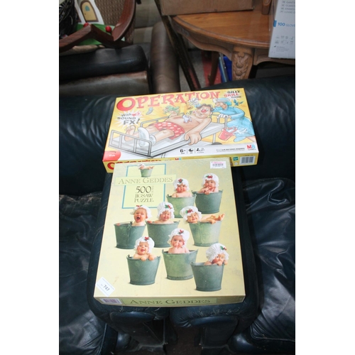 747 - BOXED OPERATION GAME AND BABY IN A BUCKET PUZZLE