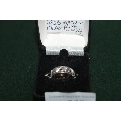 567 - 9CT GOLD AND 925 SILVER 1950s GARNET AND TOPAZ RING SIZE N-N1/2