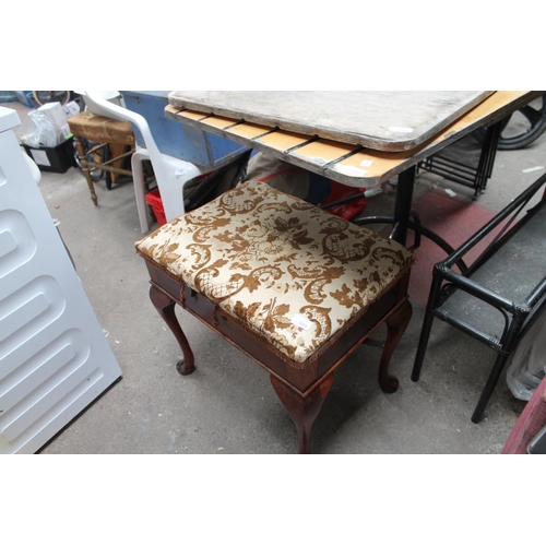 1051 - UPHOLSTERED BROWN STOOL WITH PAD FEET